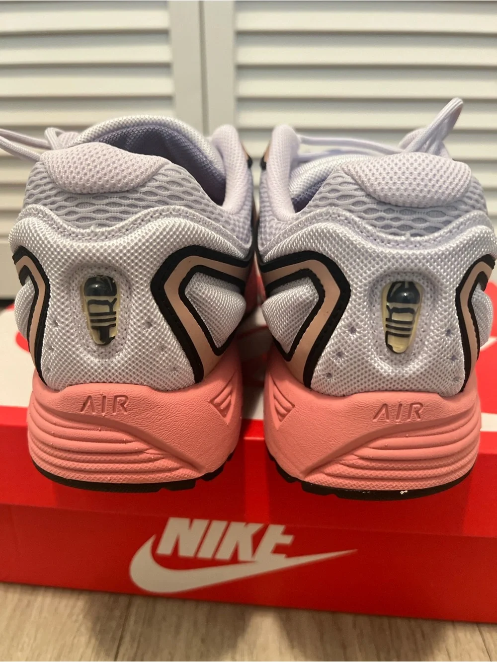 Nike men’s Pink and Gray Sneakers with Yellow Swoosh
